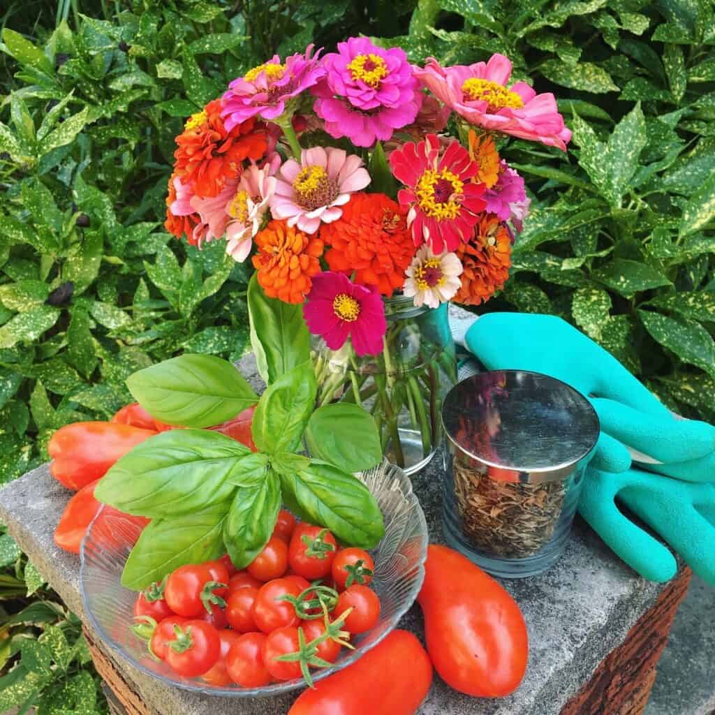 A colorful harvest of flowers, veggies and herbs from home